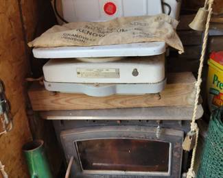 Scale and wood stove