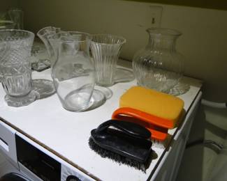 Brushes and sponge, and some glass vases, can you tell which is which?