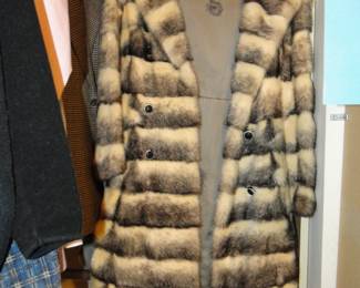 It is a 3/4 length coat