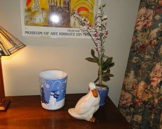 Ceramic duck, snowman trash can, and faux floral item.  Our staging is just epic!