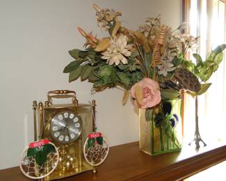 Mantel clock, and mantel flowers