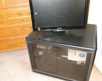 Small Vizio TV and entertainment center