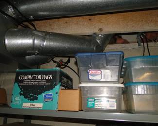 Compactor bags and more clear bins with things in them