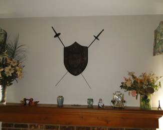 Two swords, one chest of armor....En Guarde