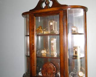 Rounded sides, and mirror back make this the perfect display case for miniature clocks