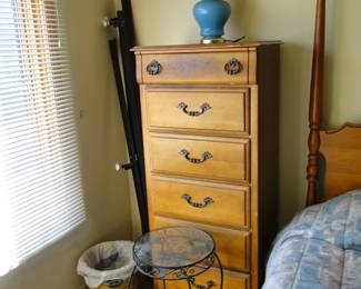 Tall wooden dresser, and small metal round table with glass top