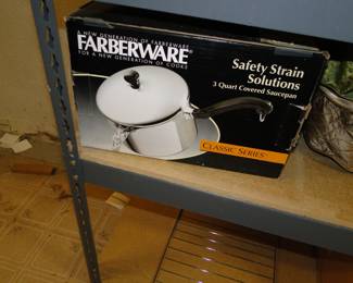 Farberware, the safe way to strain off pasta water.  Or any scalding hot liquid for that matter.