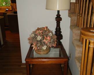Because every good side table needs to be in the hallway with a lamp and faux floral basket