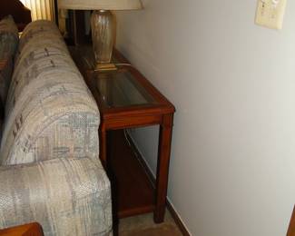 This is a sofa table, or it could be an entranceway table.  But it is shy, so give it time to warm up to the new room you put it in
