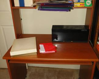 Desk that is not standard and has shelves