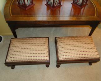 Pair of matching foot stools, one for each foot, if you do not feel like sharing