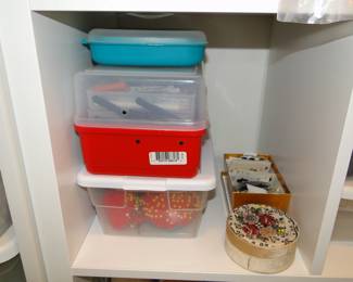 Containers of thread and pincushions too