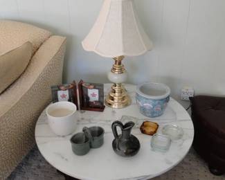 Very heavy marble topped table, with some great decorative accessories