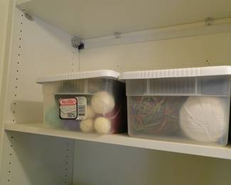 Containers of yarn.  Containers and buckets are going to be priced, for the entire content of the container.  You may open the container to view the contents, but you will not be able to remove or add to the container