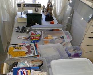 Crafting supplies, and bins, and look yonder, beer steins