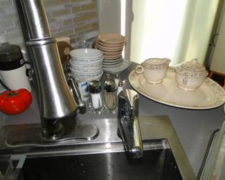 Cups and plates and bowls and saucers, and serving pieces too