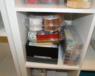 Containers of thread spools, and more ribbons too Containers and buckets are going to be priced, for the entire content of the container.  You may open the container to view the contents, but you will not be able to remove or add to the container