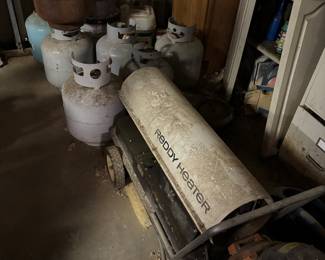 Gas containers, propane tanks, Reddy Heater, welding tanks. 