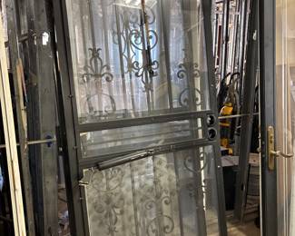 Two Double Handled Metal Doors with removable glass for screens.