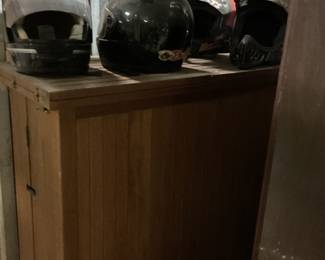Motorcycle helmets, wood bar