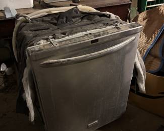 Stainless steel Dishwasher. Electric smooth top stainless steel stove, interior needs cleaning. 
