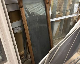 Pool stick mirror holder and two sticks and triangle. 