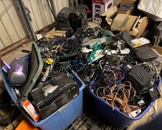 Wires, cords, radios, plugs and lots of electrical items and extension cords. 