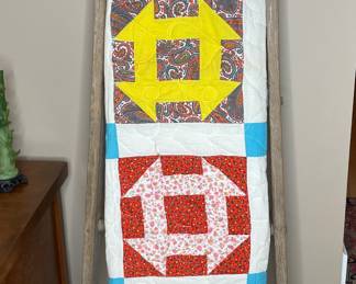 Quilt rack and vintage quilt