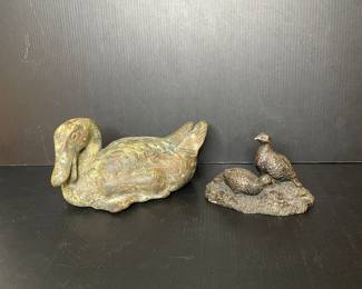 Cast iron and bronze duck figurines