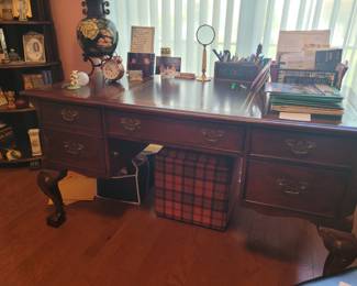 Antique leather top claw foot desk
