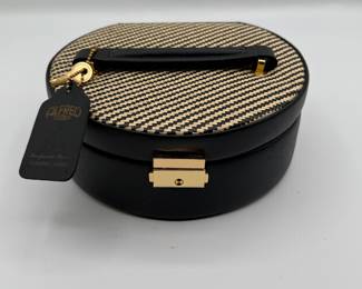 Lot #82 Hat box style portable jewelry case.