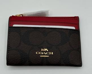 Lot #80 Coach Card Case - Signature Canvas with Red Accents.