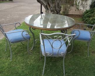 This Set is Heavy Metal and does have 4 Chairs