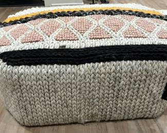 5. Mangas Woven Pouff Ottoman Designed by Patricia Urquiola (39" x 30" x 15")