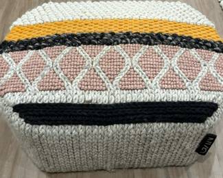 5. Mangas Woven Pouff Ottoman Designed by Patricia Urquiola (39" x 30" x 15")
