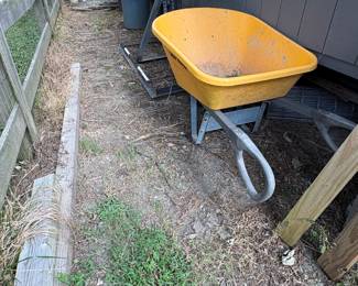 Wheelbarrow and trailer kayak rack.