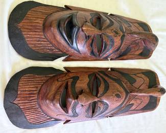 African man & woman carved wooden masks