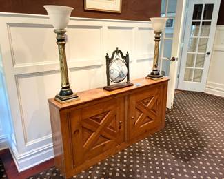 Wood cabinet with pair of pillar lamps