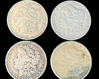 A Grouping Of 4 Morgan Silver Dollars Various Dates, Ungraded.