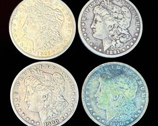A Grouping Of 4 Morgan Silver Dollars Various Dates, Ungraded.