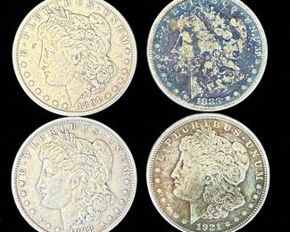 A Grouping Of 4 Morgan Silver Dollars Various Dates, Ungraded.