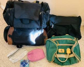 Four (4) mid-size, carry travel bags
