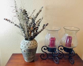 Two (2) ribbed glass candle holders with metal bases and candles