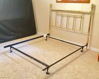 Metal bed frame with gold-tone headboard