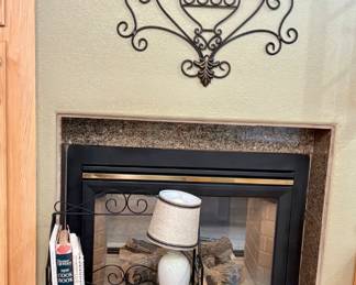 Bakers rack, cookbooks and wall decor