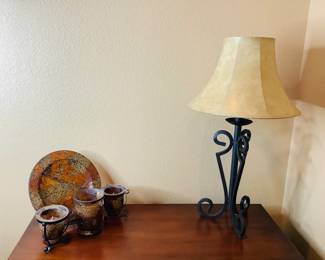 Dark brown metal lamp with beige lamp shade
