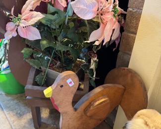 Wooden turkey and pretty pink pointsettas