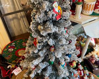 Small lightly flocked tree