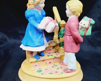 	1982 Avon Keeping the Christmas Tradition Figurine