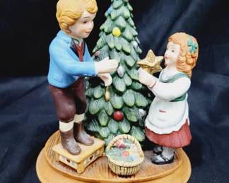 	1982 Avon Keeping the Christmas Tradition Figurine